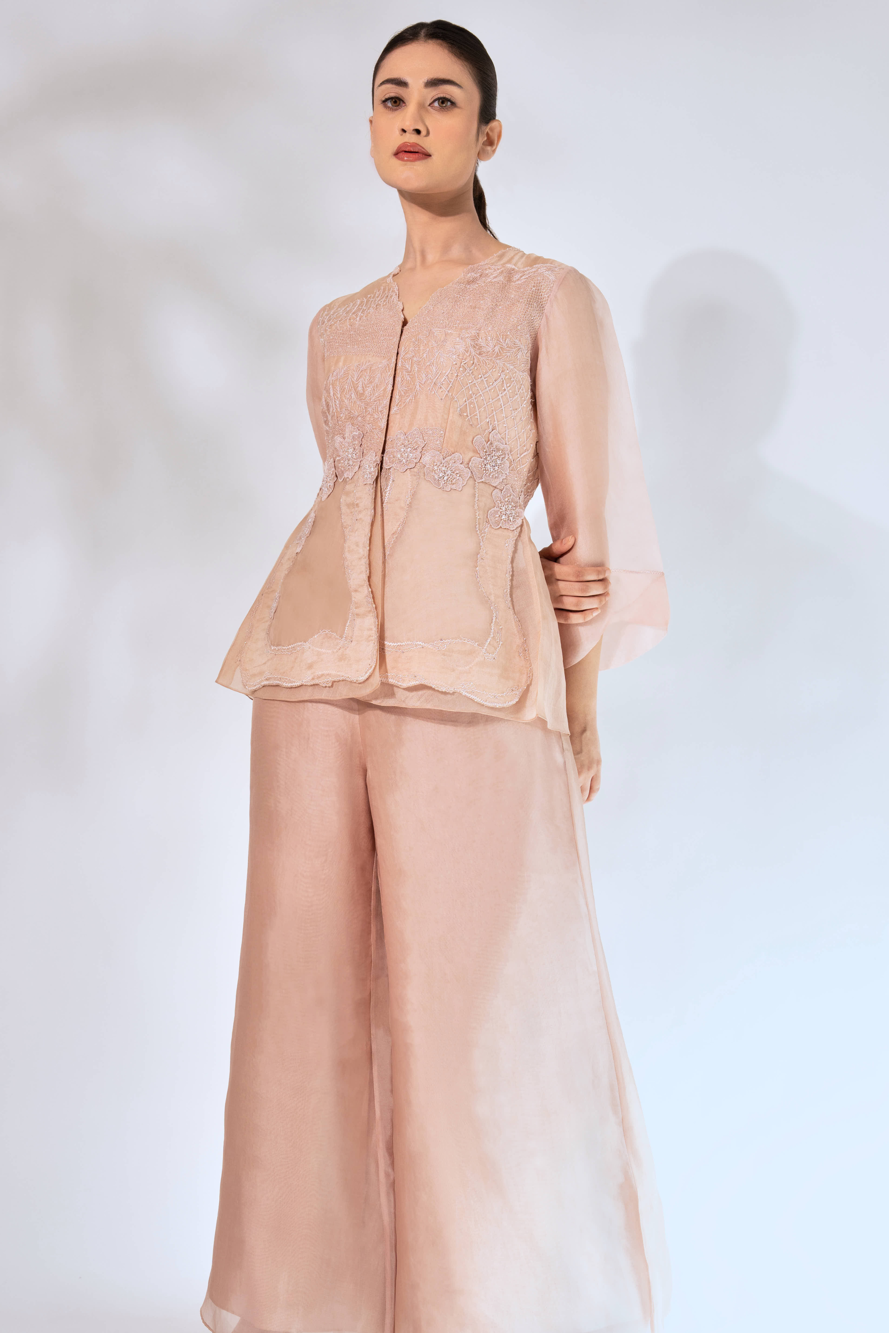 Peach Wave Peplum Top