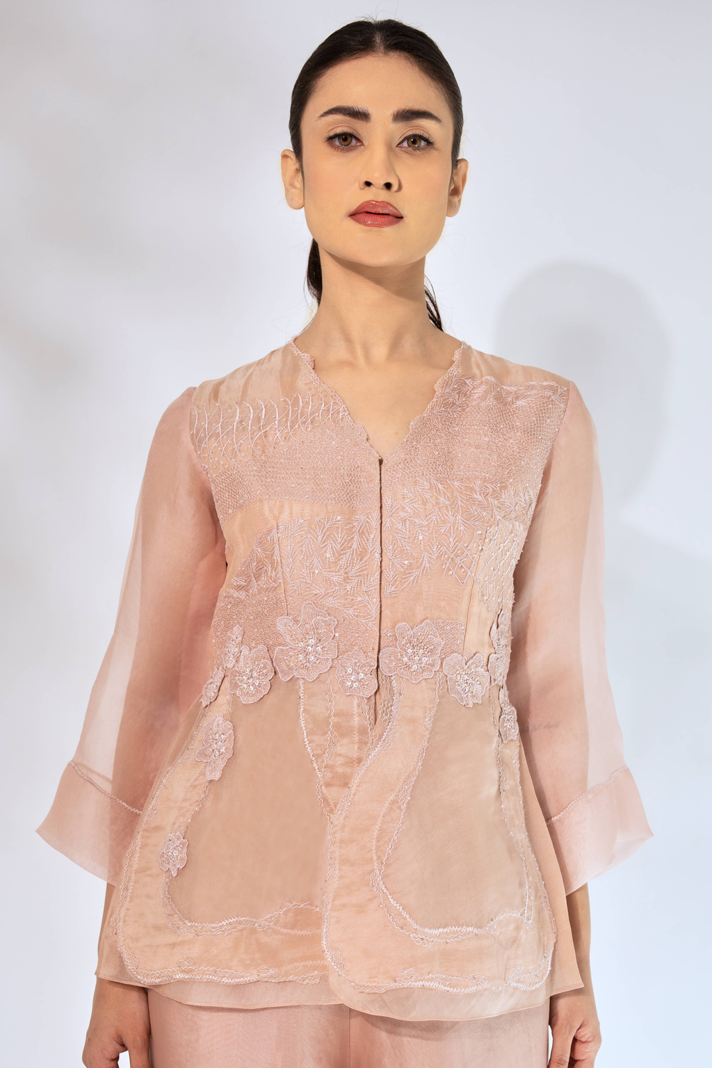 Peach Wave Peplum Top