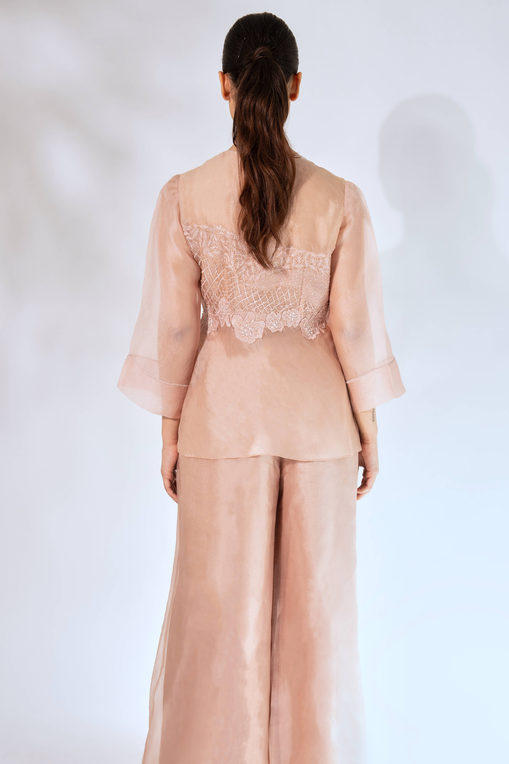 Peach Wave Peplum Top