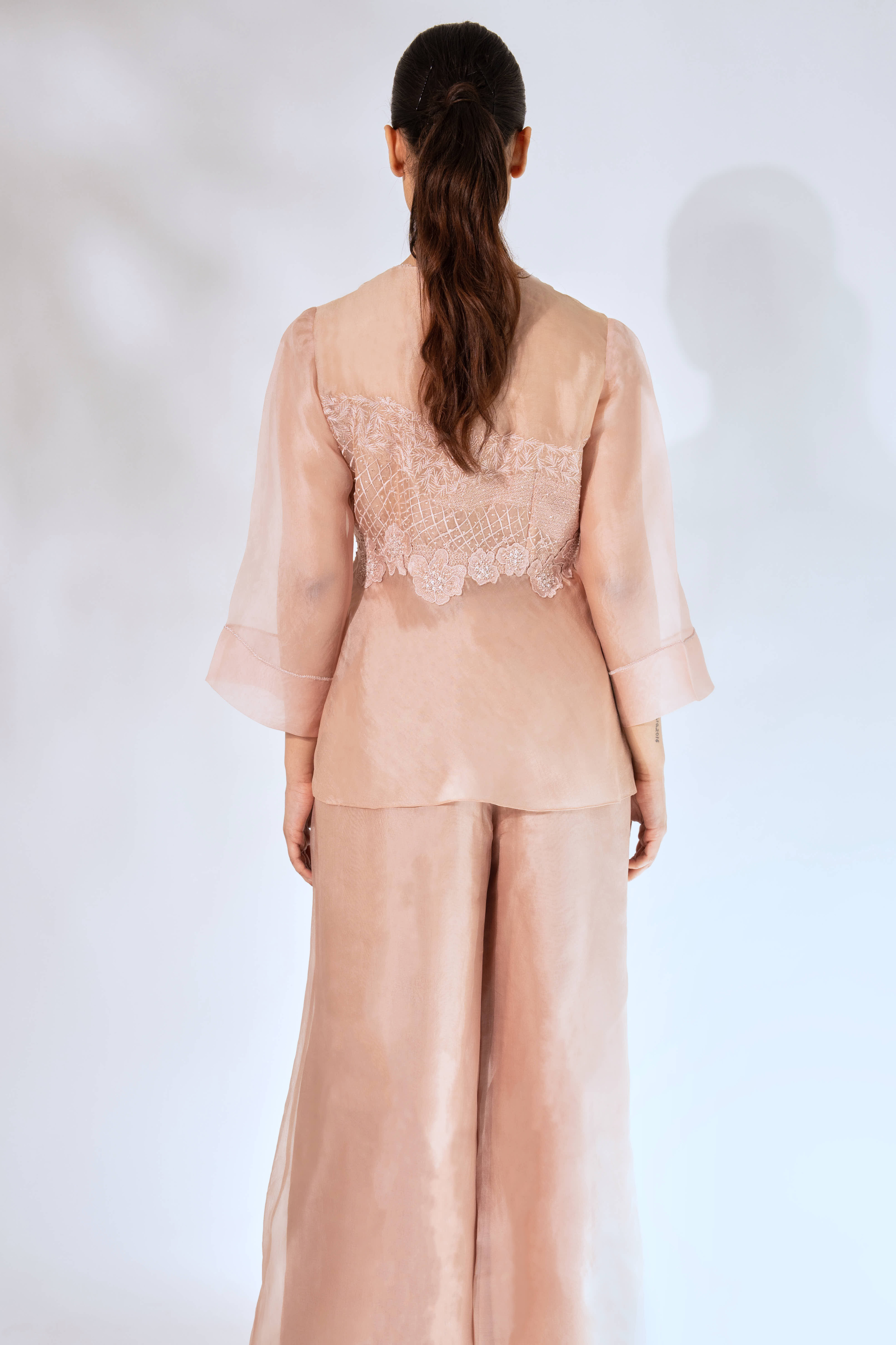 Peach Wave Peplum Top